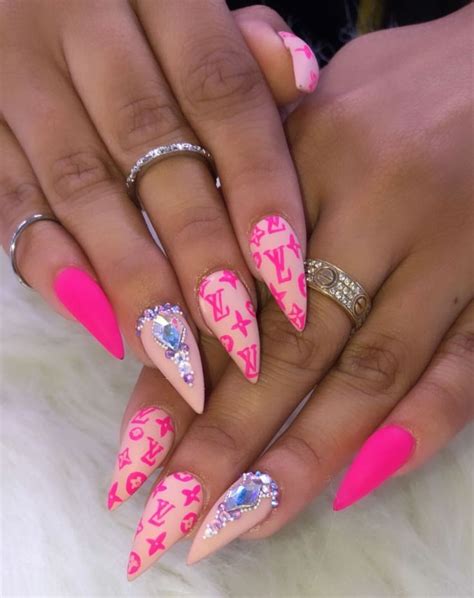 Trendy Pink Nail Designs with a Touch of Louis Vuitton 